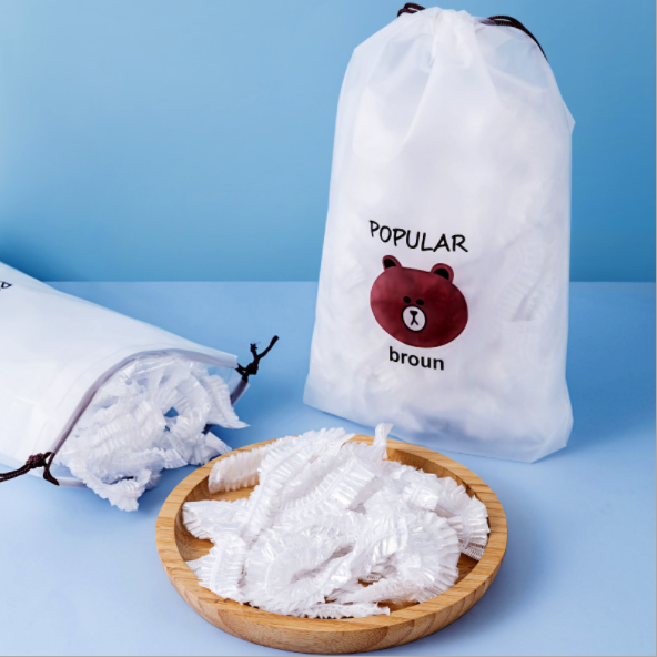 100 clear disposable food covers in packaging, ready for kitchen fresh keeping, storage, picnics, and camping needs.