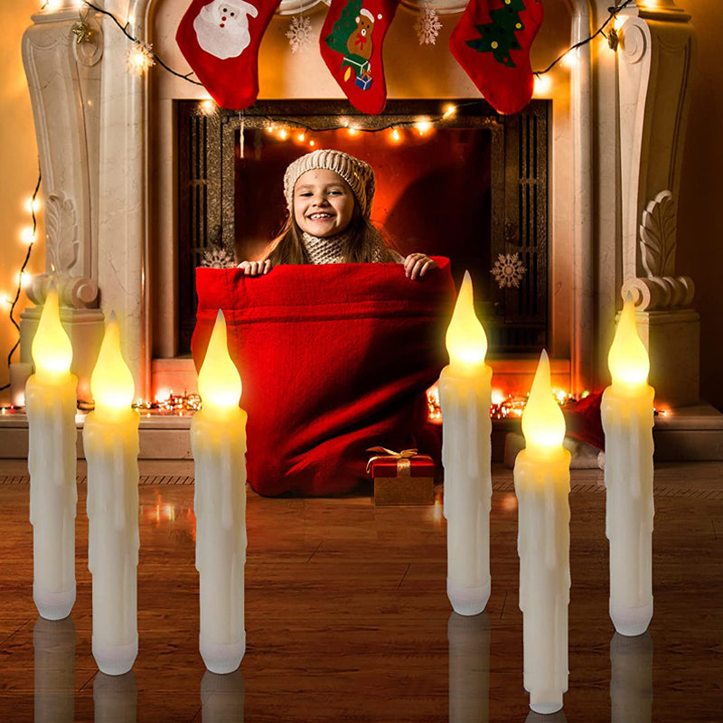 Beautiful flickering light from floating LED taper candles, 12-pack, enhancing any room