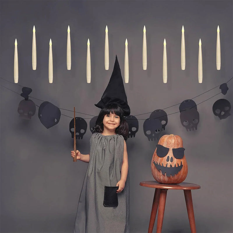 Enhance home ambiance with this 12-pack of floating LED taper candles & remote control