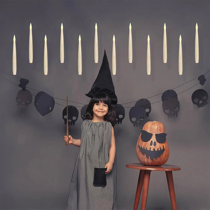 Enhance home ambiance with this 12-pack of floating LED taper candles & remote control