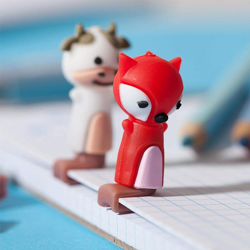 Vibrant ergonomic pencil grips for children, a handwriting aid made from soft silicone material