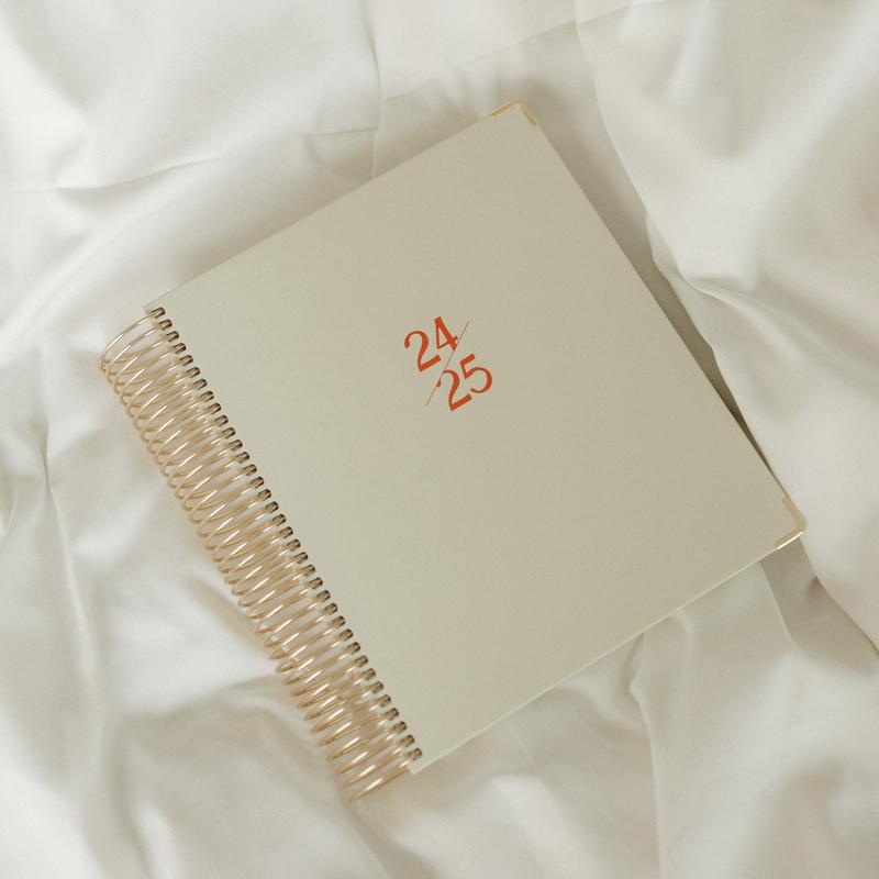 2024-2025 Comprehensive Daily & Teacher Planner with colorful pages and organizational tabs.