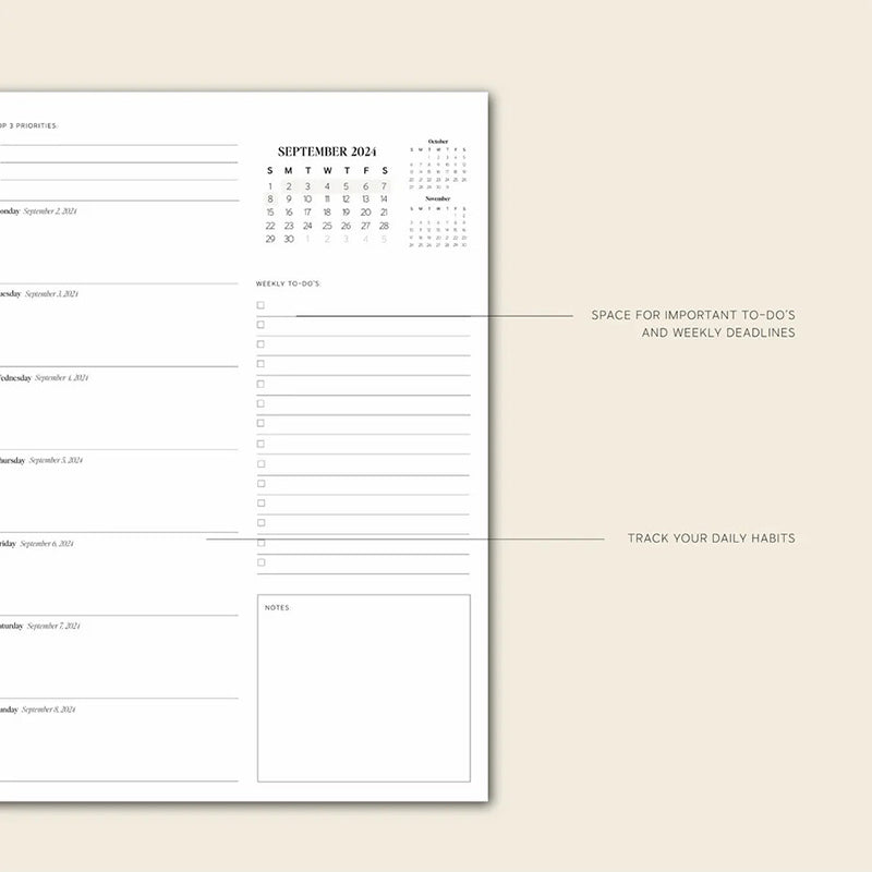A 2024-2025 daily planner next to a laptop, representing office supplies.