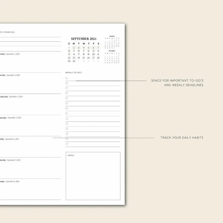 A 2024-2025 daily planner next to a laptop, representing office supplies.