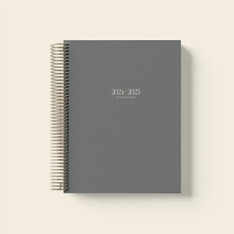 Minimalist design 2024-2025 daily planner open to a goal-setting page.