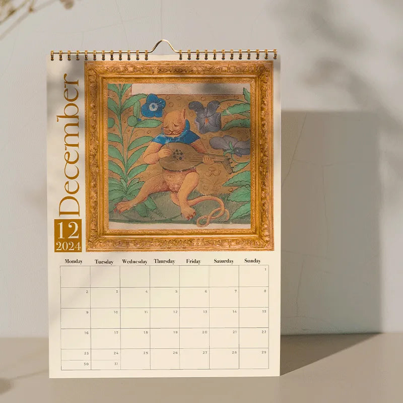 Gift-ready 2024 wall calendar with charming medieval cat designs, a unique present.