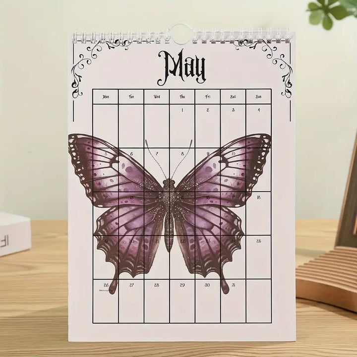 2025 gothic calendar hanging on a dark wall, accentuating its vintage castle aesthetic.