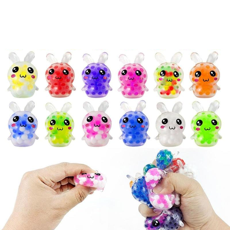 Assorted squeeze toys in 24 colorful prefilled Easter eggs, ideal for kids' party favors and stress relief.