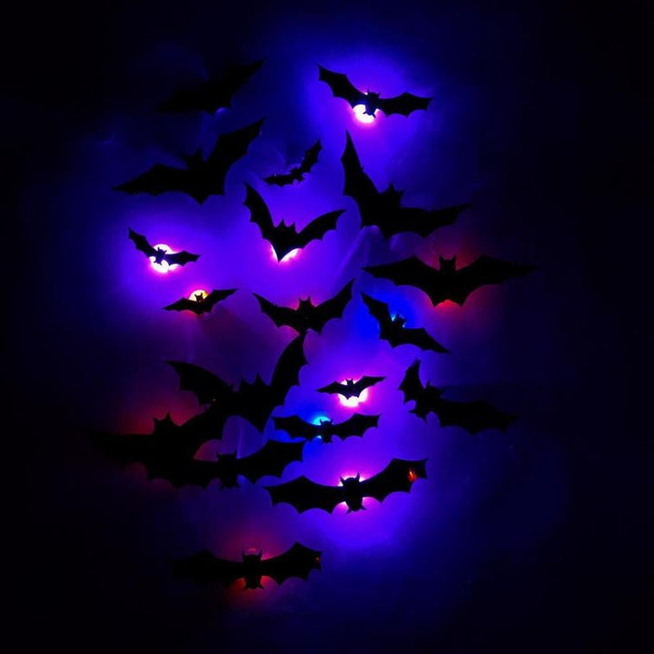 Close-up of a 3D bat LED, glowing with purple light, perfect for spooky Halloween decor