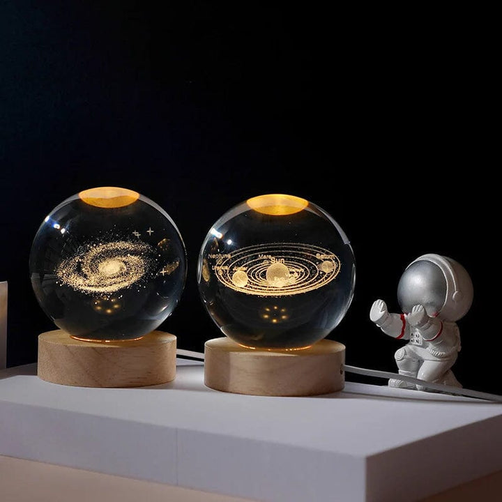 Gift idea: illuminated crystal ball with detailed 3D engraving & wood stand