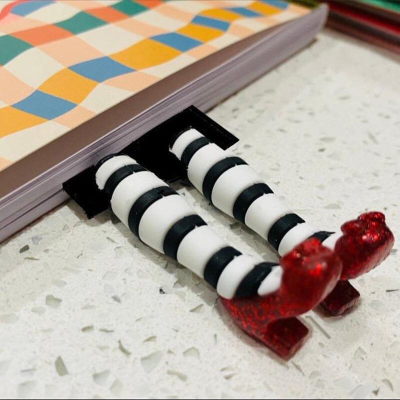 Bookworm accessory: a 3D witch leg bookmark, adding a touch of magic and fun to reading