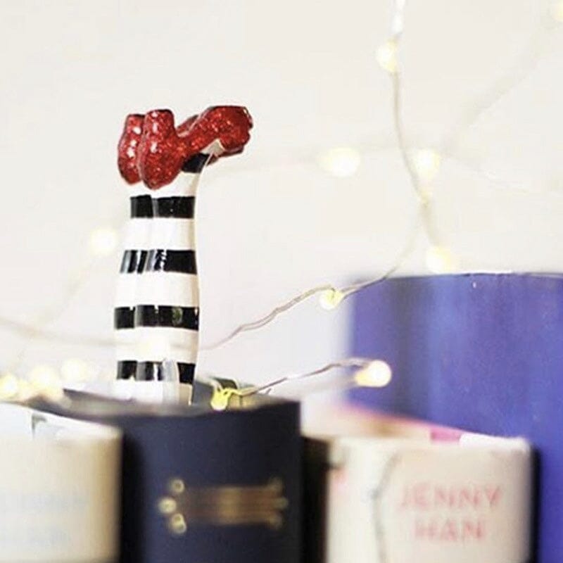 Detailed shot of the 3D Wicked Witch Leg Bookmark, showcasing its unique design and vibrant colors