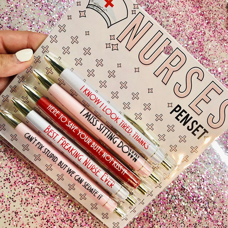 Assorted funny nurse pens, a 5-piece set, displaying 'Coffee Scrubs & Rubber Gloves' text