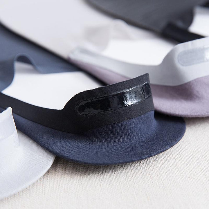 Stack of unisex no-show ice silk ankle socks in multiple neutral shades for everyday comfort