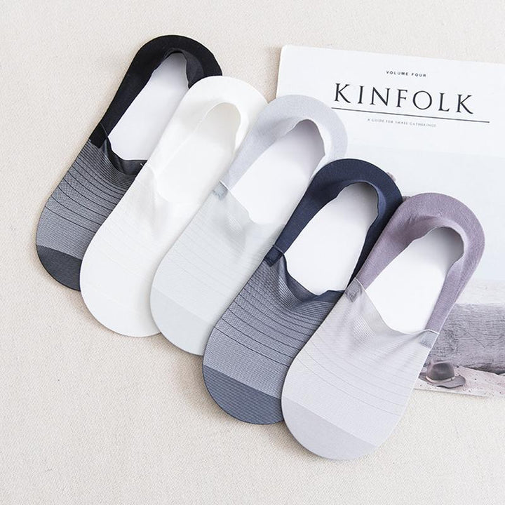 The ultra-thin, breathable fabric of an ice silk ankle sock stretched to show elasticity and comfort