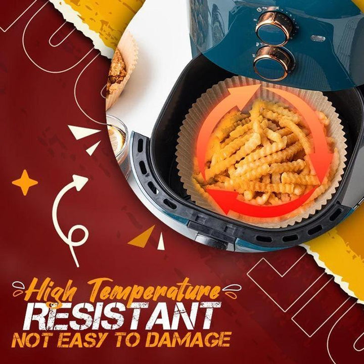 Hand holding a disposable air fryer liner, demonstrating its flexibility and nonstick quality for cooking