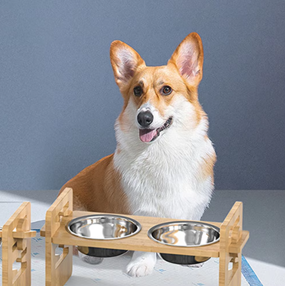 Adjustable elevated pet feeding station with stainless steel bowls, wooden frame, ergonomic design, suitable for all pet size