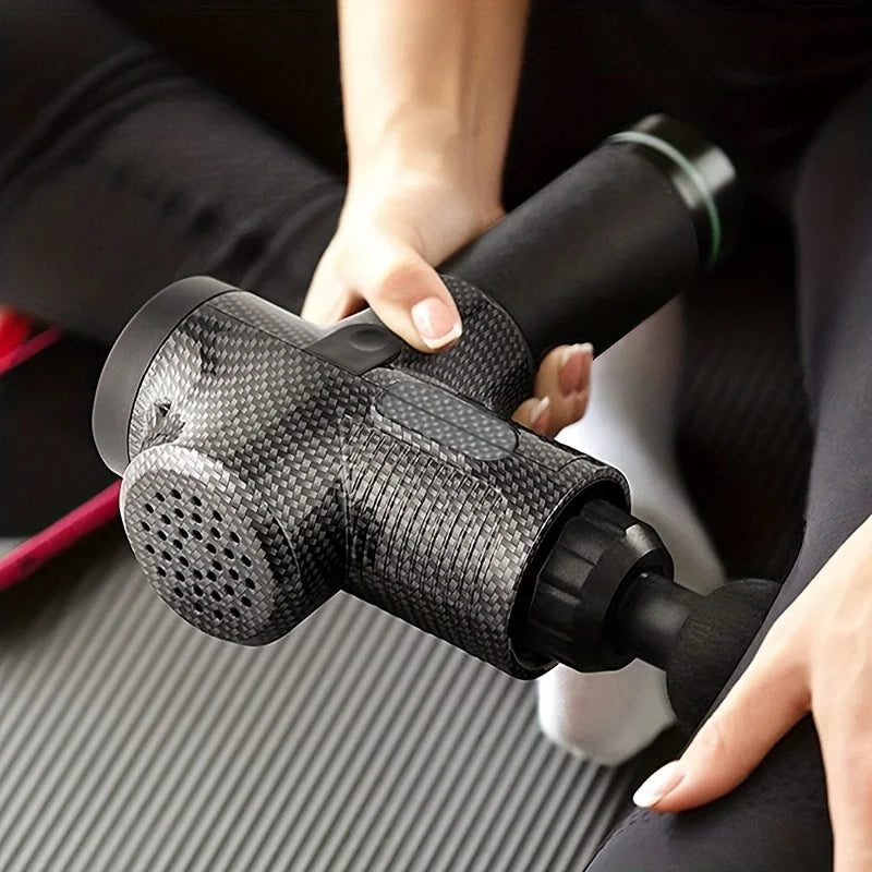 "Advanced deep tissue massage gun for muscle recovery with sleek design and multiple attachments, ideal for athletes."