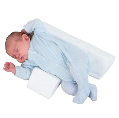 Anti-Roll Adjustable Memory Foam Baby Pillow in Pink, side-sleeper support, gentle and breathable design for newborns.