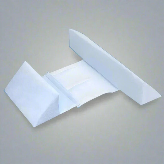 Anti-Roll Adjustable Memory Foam Baby Pillow in Pink, side-sleeper support, gentle and breathable design for newborns.