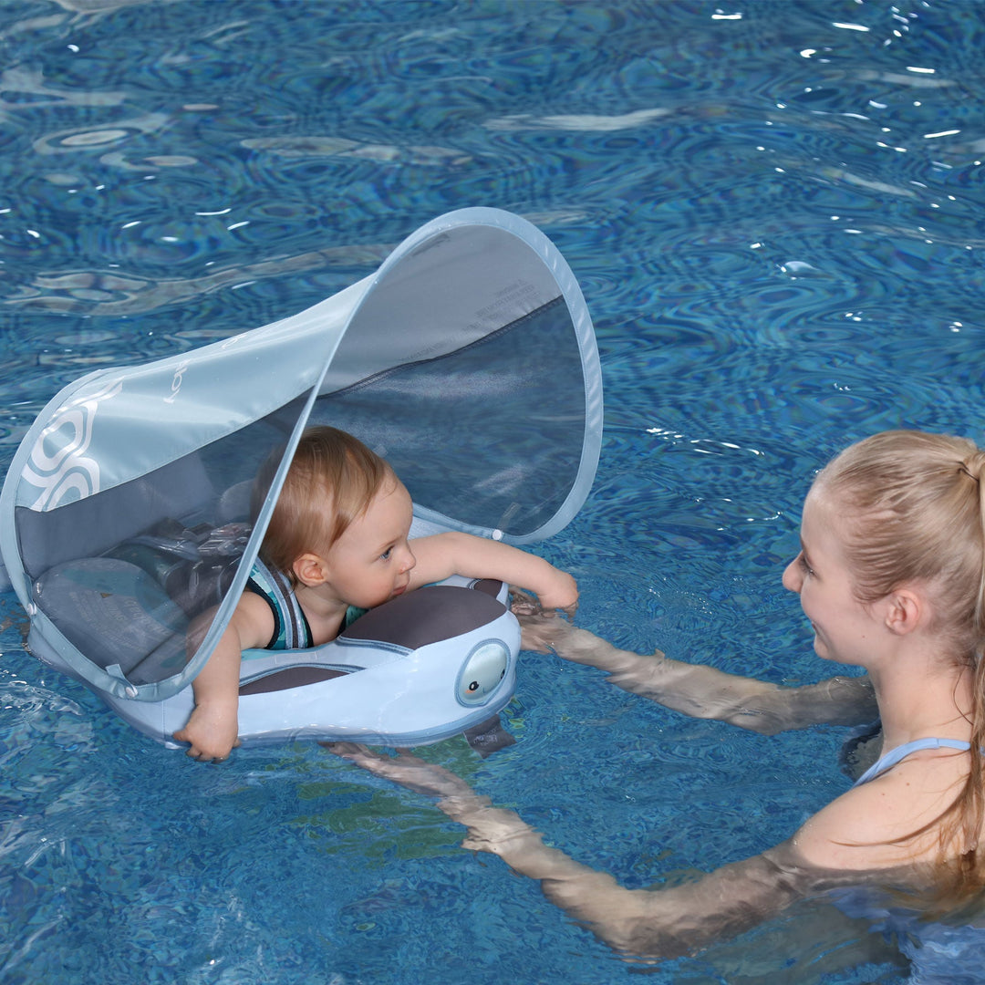 Baby Swim Trainer Floater in blue for safe water fun, featuring ergonomic design and UV protection. Suitable for kids up to 1