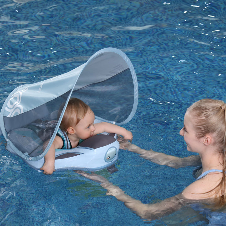 Baby Swim Trainer Floater in blue for safe water fun, featuring ergonomic design and UV protection. Suitable for kids up to 1
