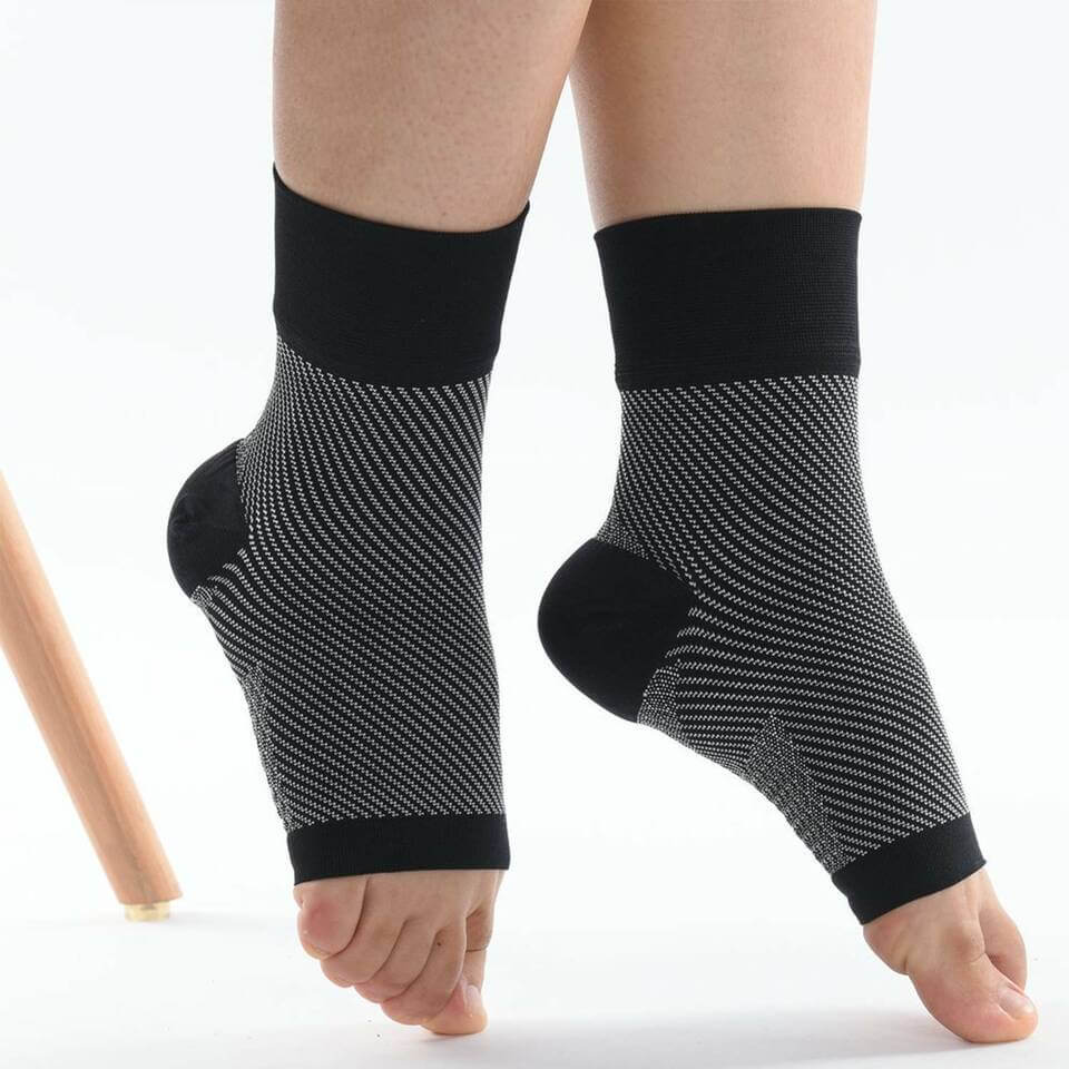 "Black unisex SootheFlex compression sport socks, breathable, seamless design, perfect for athletic performance support."