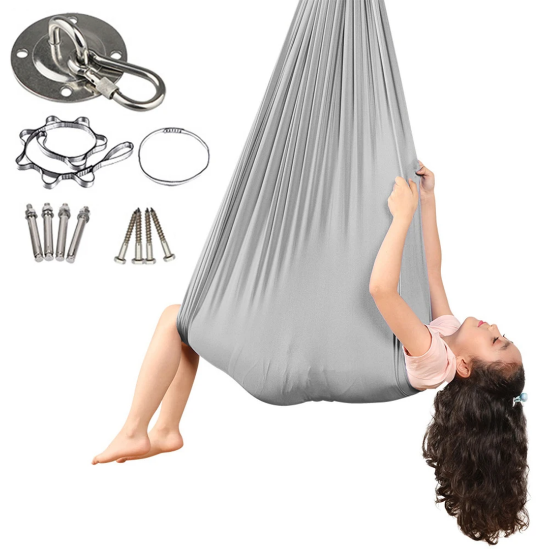 "Calming therapeutic swing for kids with ADHD or autism, shown in soft, stretchy fabric with calming colors."
