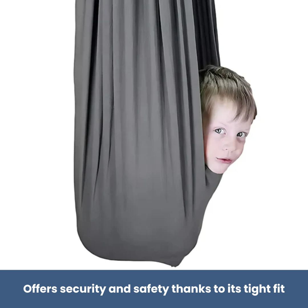 "Calming therapeutic swing for kids with ADHD or autism, shown in soft, stretchy fabric with calming colors."