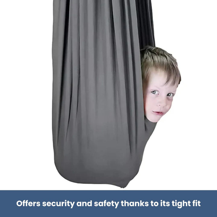 "Calming therapeutic swing for kids with ADHD or autism, shown in soft, stretchy fabric with calming colors."