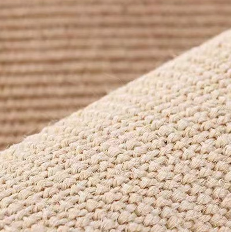 "Cat scratch protector mat for sofa armrest with sisal, discreet design, prevents furniture damage, enhances home decor."
