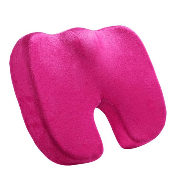 "Coccyx cushion with U-shape cutout, gray memory foam for tailbone pain relief, ergonomic design, enhances sitting comfort."