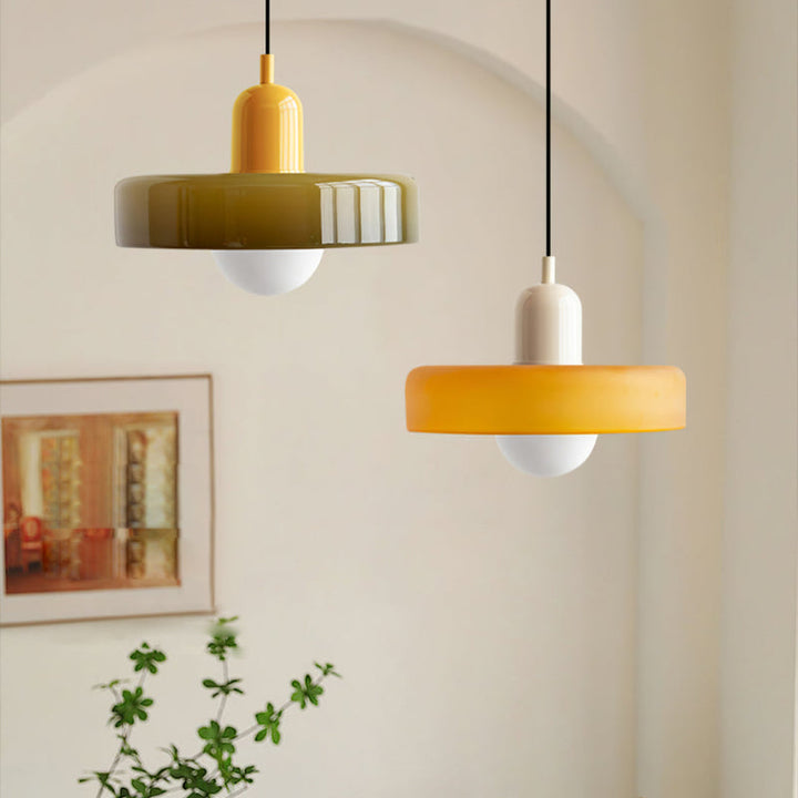"Colourful glass pendant lamp in Bauhaus style featuring red, green, pink, and yellow stained glass for artistic decor."