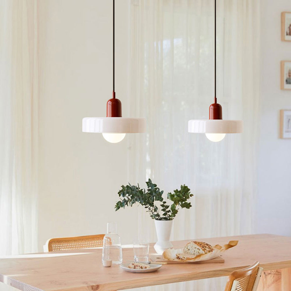 "Colourful glass pendant lamp in Bauhaus style featuring red, green, pink, and yellow stained glass for artistic decor."