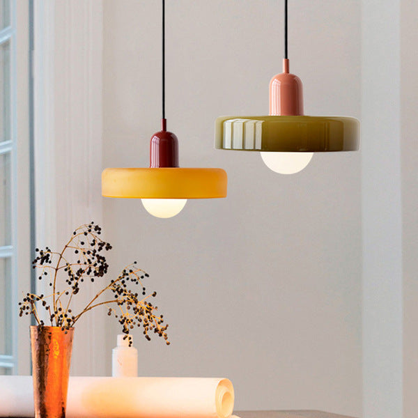 "Colourful glass pendant lamp in Bauhaus style featuring red, green, pink, and yellow stained glass for artistic decor."