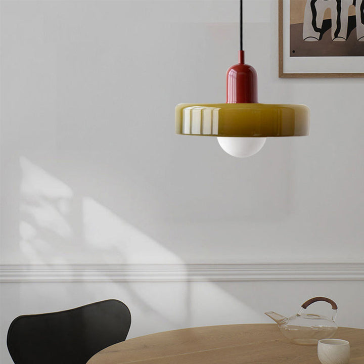 "Colourful glass pendant lamp in Bauhaus style featuring red, green, pink, and yellow stained glass for artistic decor."