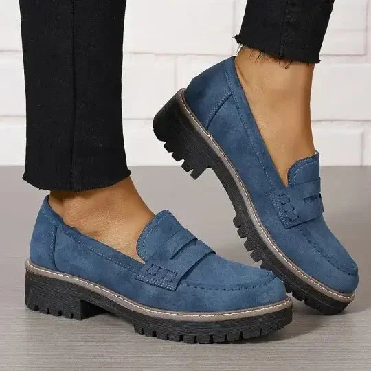 "Comfortable women's slip-on suede sandals showcasing soft suede texture and supportive sole for stylish all-day wear."