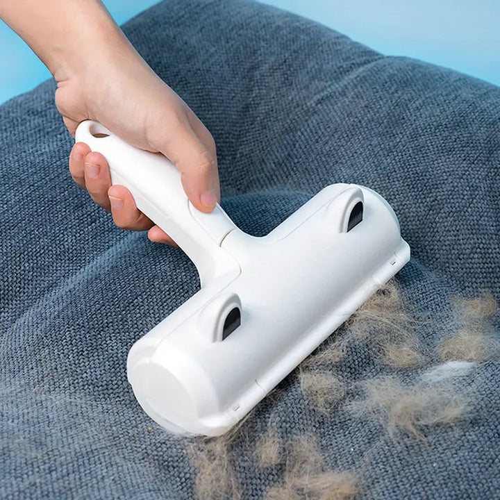"Compact pet hair remover for easy cleaning; efficiently removes hair from furniture and clothes, eco-friendly, portable desi