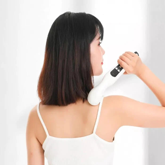 "Compact ultrasonic therapy machine for pain relief with sleek design, offering targeted comfort and muscle stimulation."