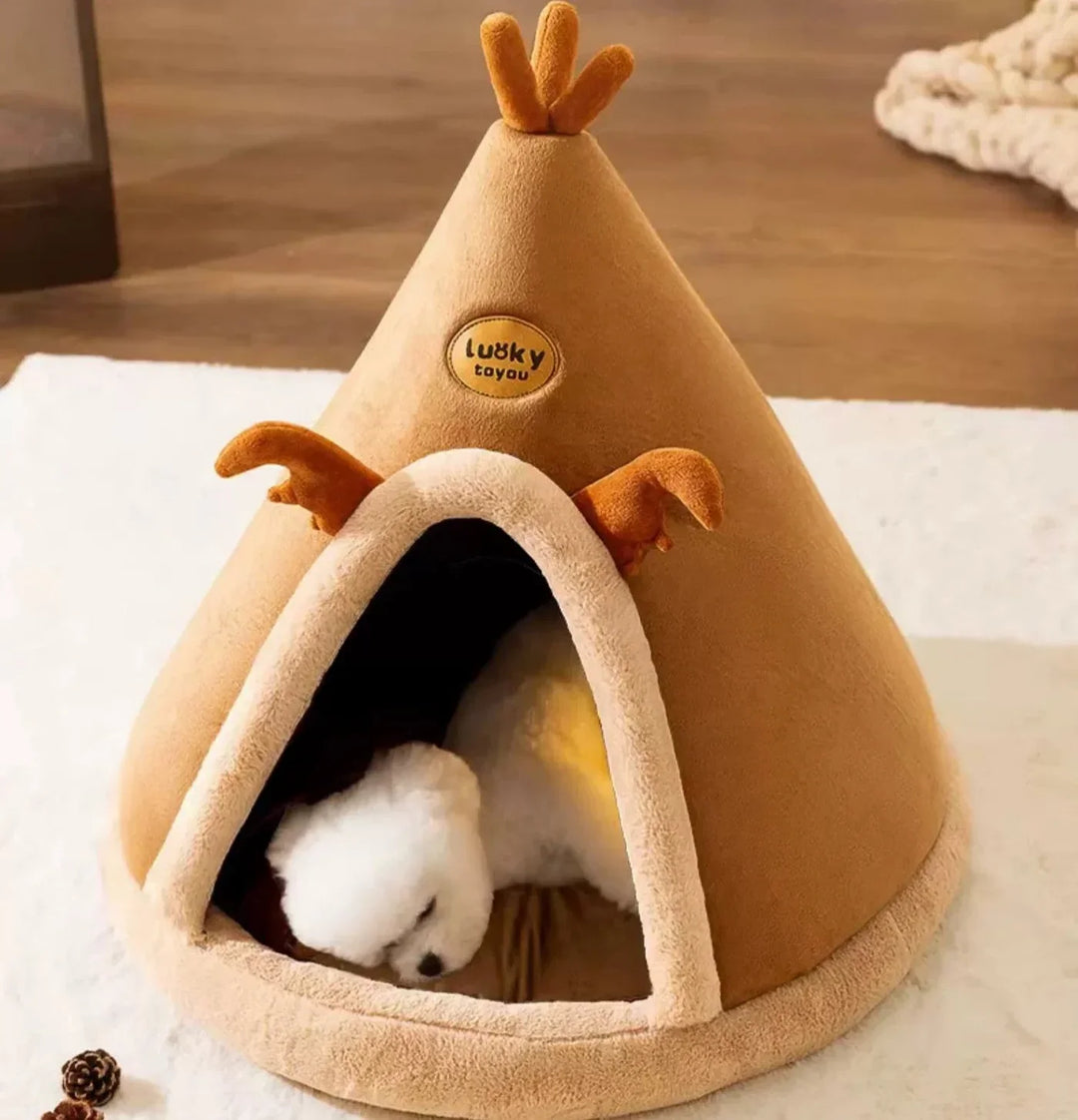 "Cosy teepee cuddle cave for dogs and cats with plush padding, heat-retentive material, and chic design for comfort and style