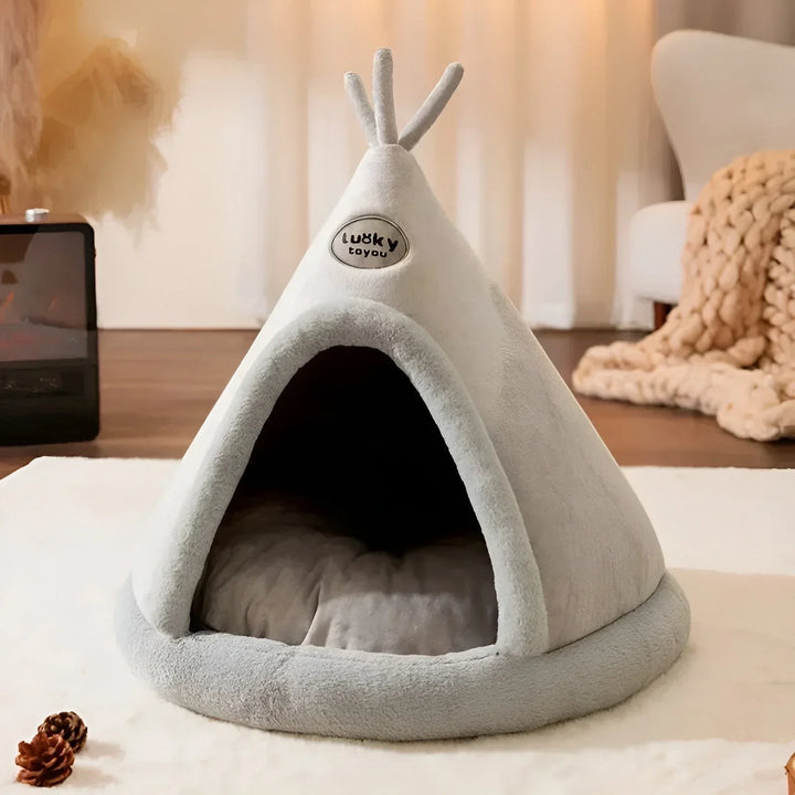 "Cosy teepee cuddle cave for dogs and cats with plush padding, heat-retentive material, and chic design for comfort and style