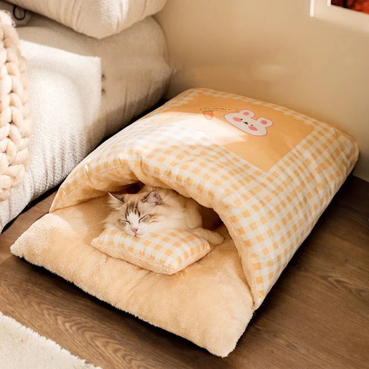 "Cozy plush cat cave bed in stylish neutral tones, offering warmth and security for ultimate feline comfort and relaxation."