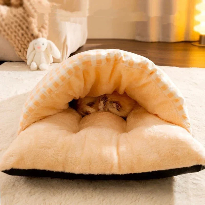 "Cozy plush cat cave bed in stylish neutral tones, offering warmth and security for ultimate feline comfort and relaxation."