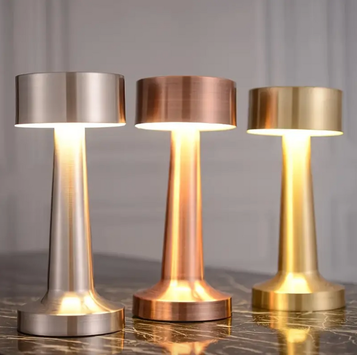 "Elegant cordless dimmable LED table lamp with touch control, ideal for living rooms and bedrooms in gold, rose gold, or silv