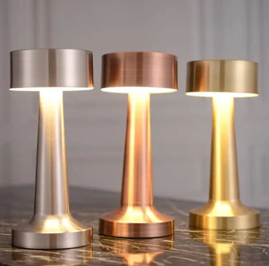 "Elegant cordless dimmable LED table lamp with touch control, ideal for living rooms and bedrooms in gold, rose gold, or silv