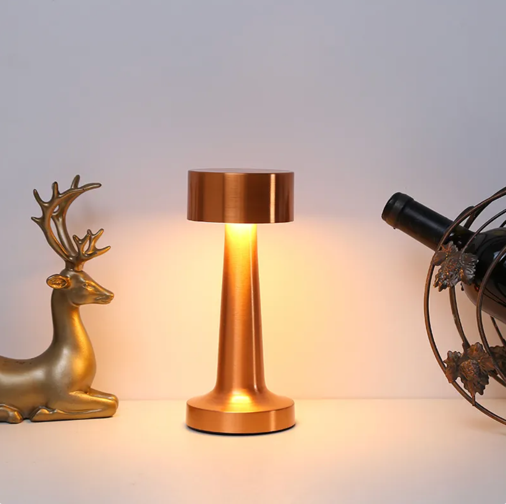 "Elegant cordless dimmable LED table lamp with touch control, ideal for living rooms and bedrooms in gold, rose gold, or silv