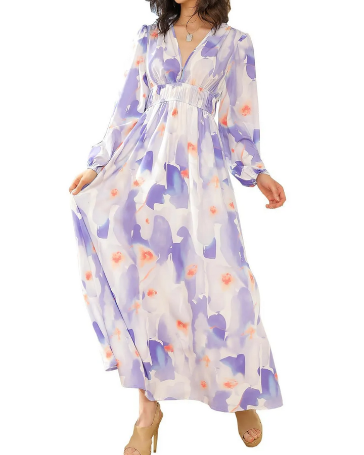 Elegant floral maxi dress with vibrant patterns, graceful flow, and versatile design for any formal occasion or event.