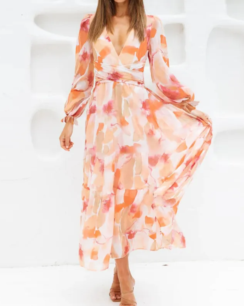 Elegant floral maxi dress with vibrant patterns, graceful flow, and versatile design for any formal occasion or event.