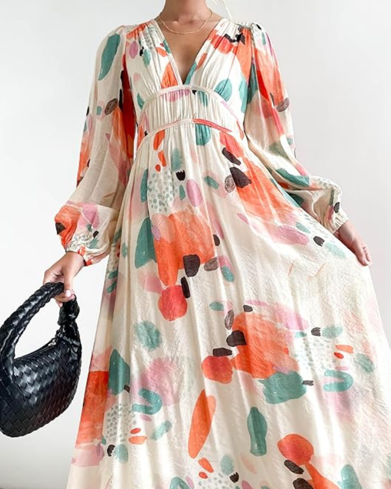 Elegant floral maxi dress with vibrant patterns, graceful flow, and versatile design for any formal occasion or event.