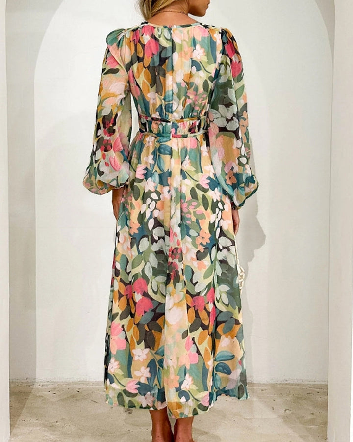 Elegant floral maxi dress with vibrant patterns, graceful flow, and versatile design for any formal occasion or event.